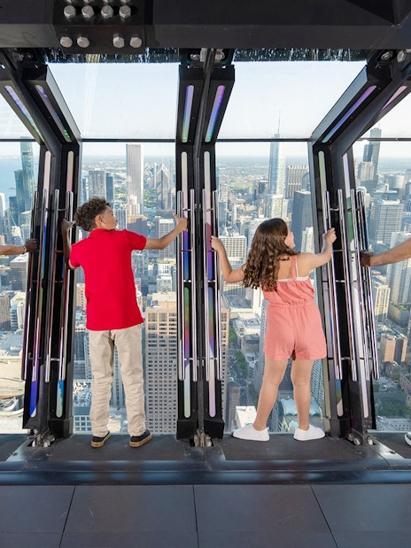 Visitors enjoying the view from Chicago 360 Observation Deck.