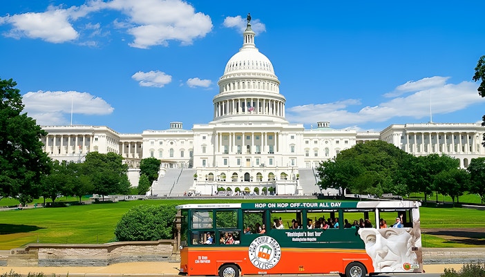 Hop-on hop-off tour bus in front of the U.S. Capitol, Washington DC.