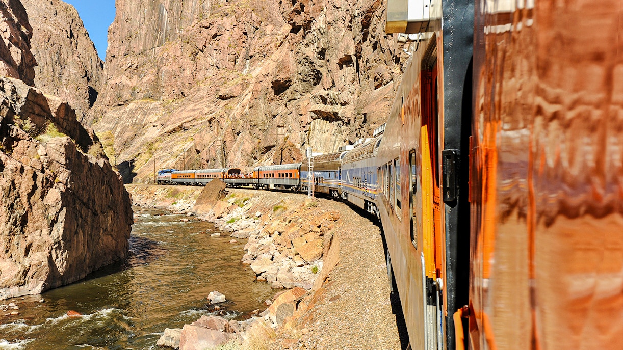 Royal Gorge train crossing a bridge over the Arkansas River in Colorado.