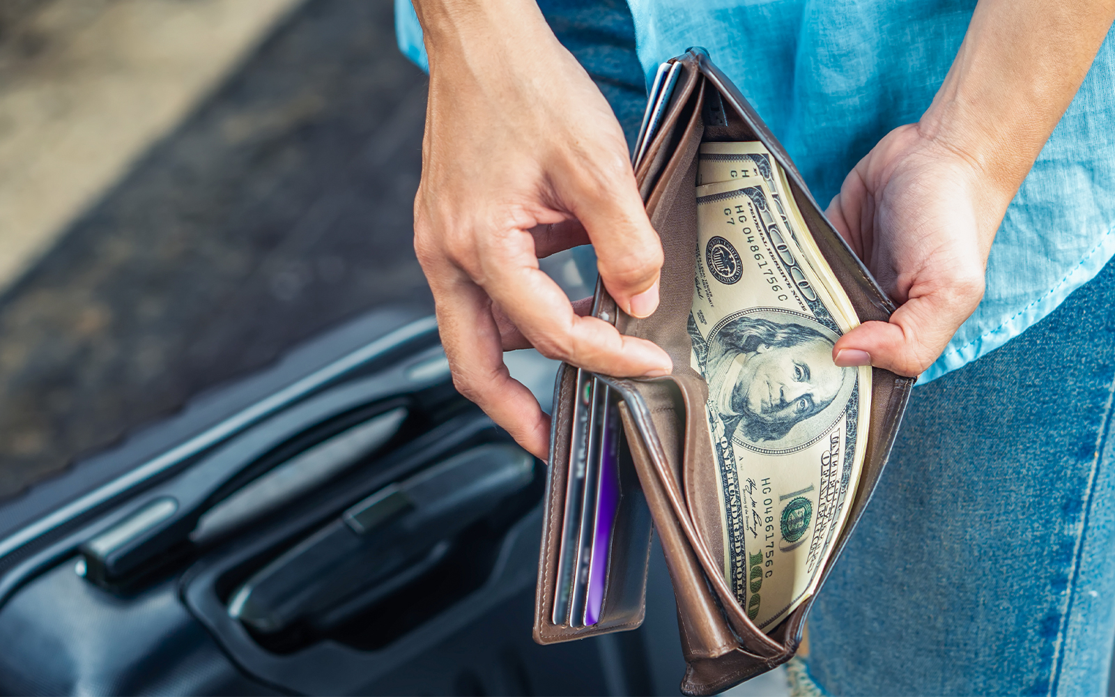 A female tourist clicking pictures during Malta Hop-On Hop-Off Bus Tour