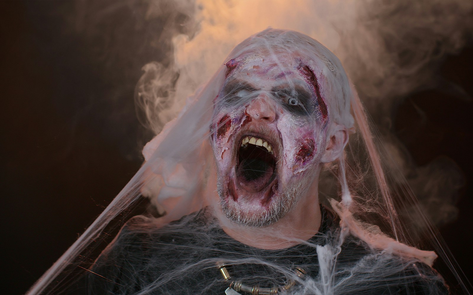 Zombie costume with cobwebs at Fright Dome, Las Vegas.