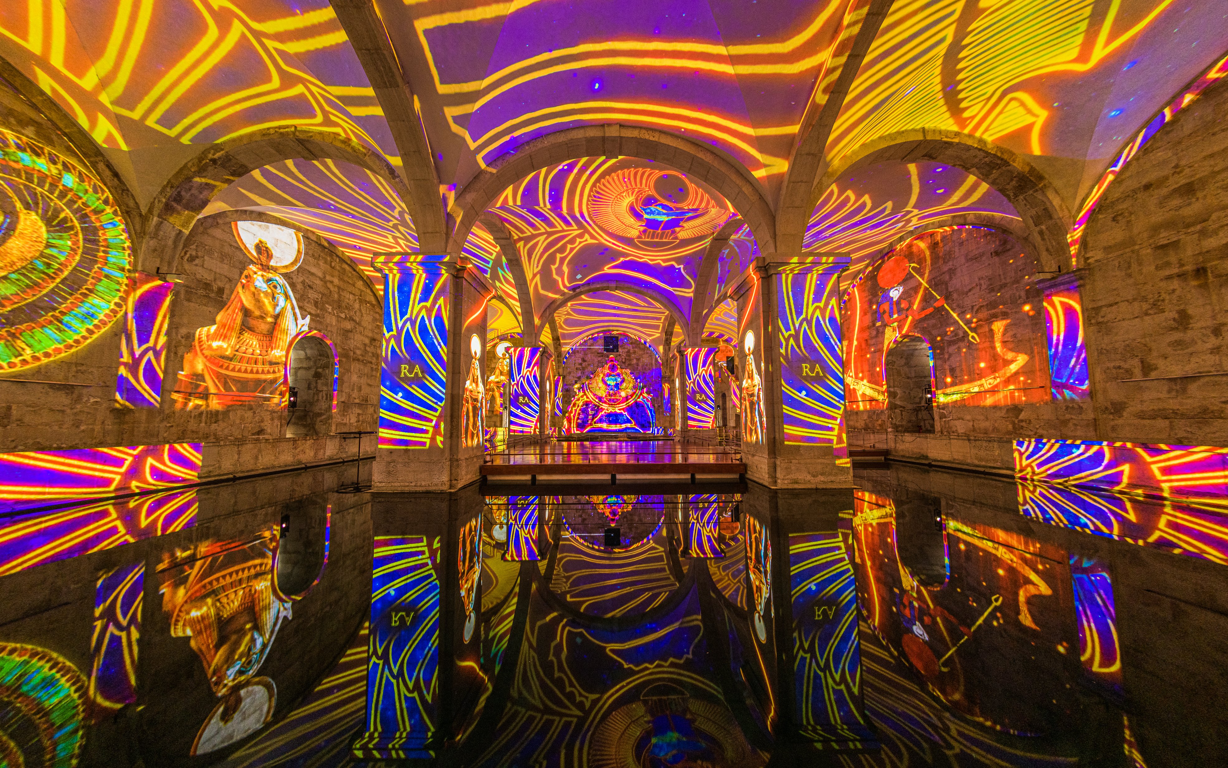 Visitors at Immersivus Gallery Lisbon experiencing an audiovisual show on Ancient Egypt.