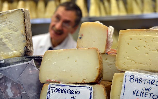 Cheese selection at a Trastevere market during guided food tour.