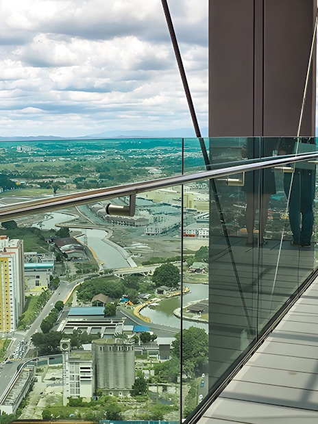 Visitors enjoying panoramic views from The Shore Sky Tower observation deck.