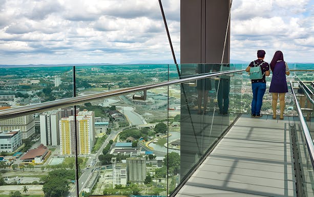 Visitors enjoying panoramic views from The Shore Sky Tower observation deck.