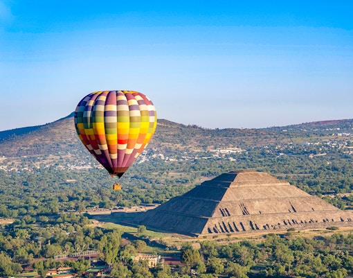Hot air balloon over Teotihuacan Pyramid of the Sun, Mexico.