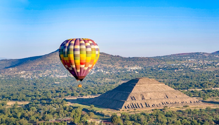 Hot air balloon over Teotihuacan Pyramid of the Sun, Mexico.