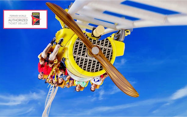 Roller coaster ride at Ferrari World Abu Dhabi with passengers enjoying the thrill.