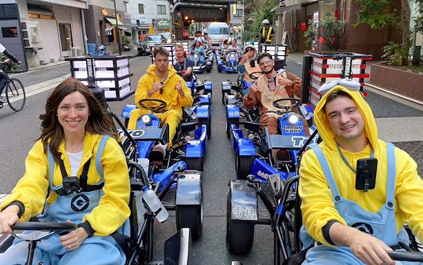 People in costumes driving go-karts on Asakusa Street during GoKart Experience in Tokyo.