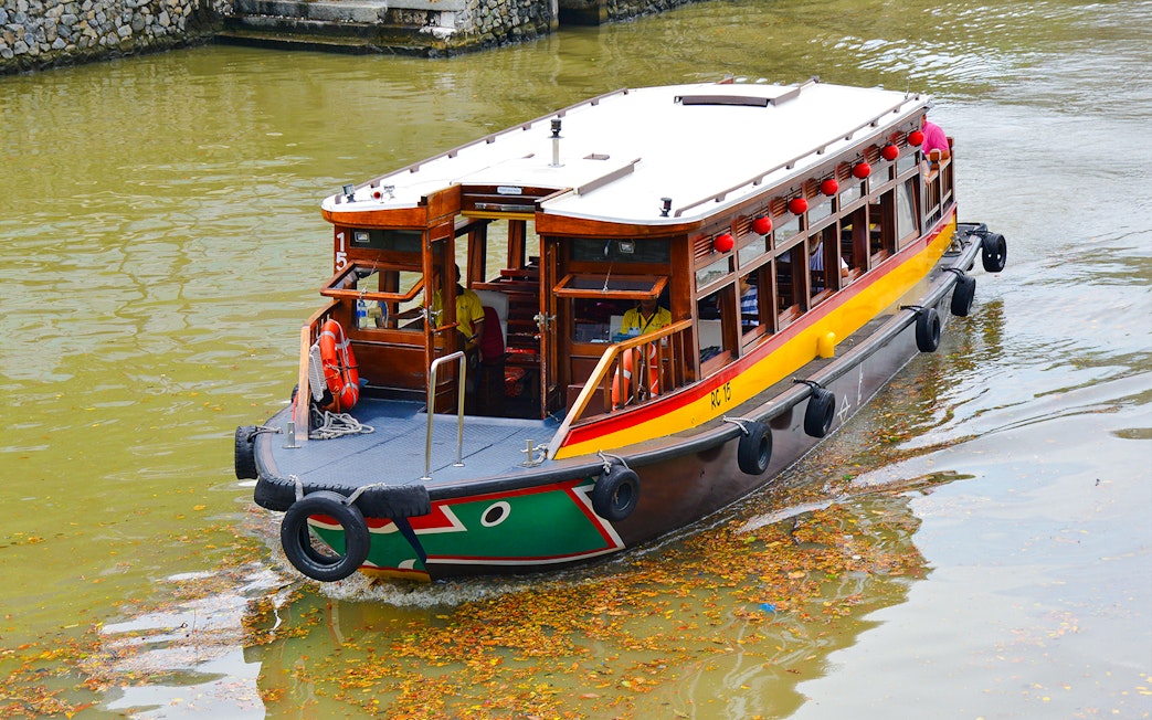 Traditional boat on Singapore River cruise.