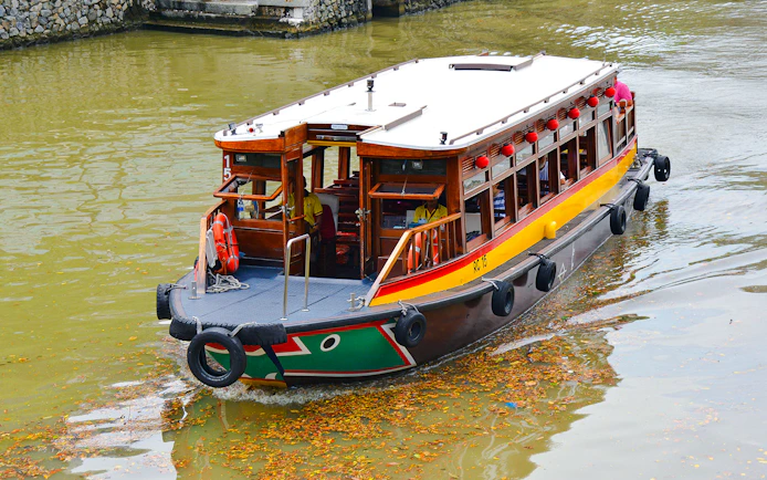 Traditional boat on Singapore River cruise.
