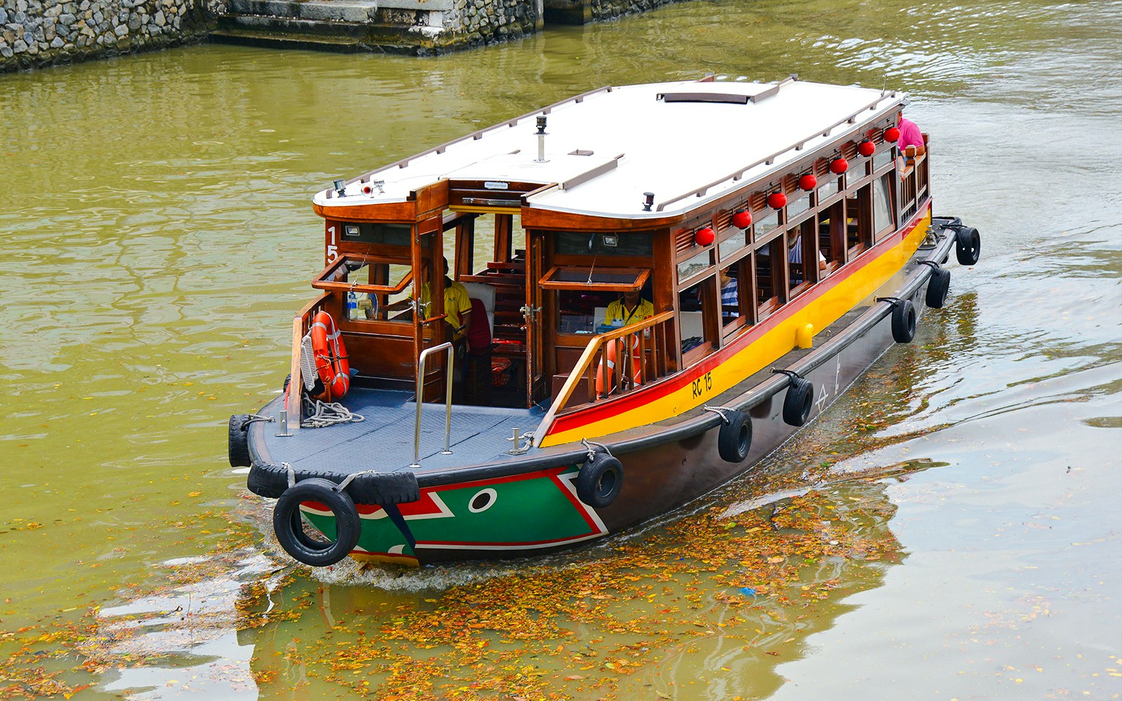 Traditional boat on Singapore River cruise.