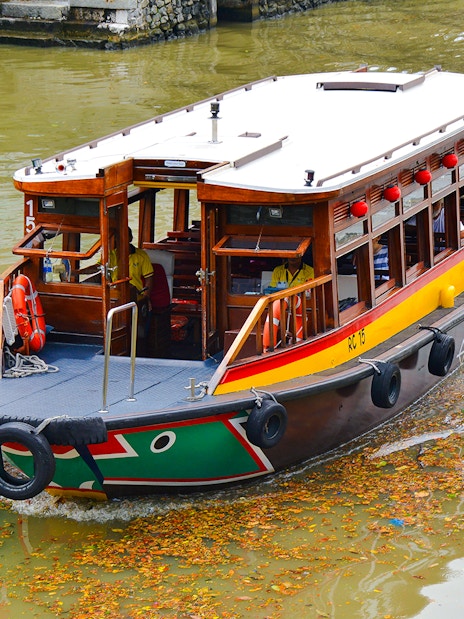 Traditional boat on Singapore River cruise.