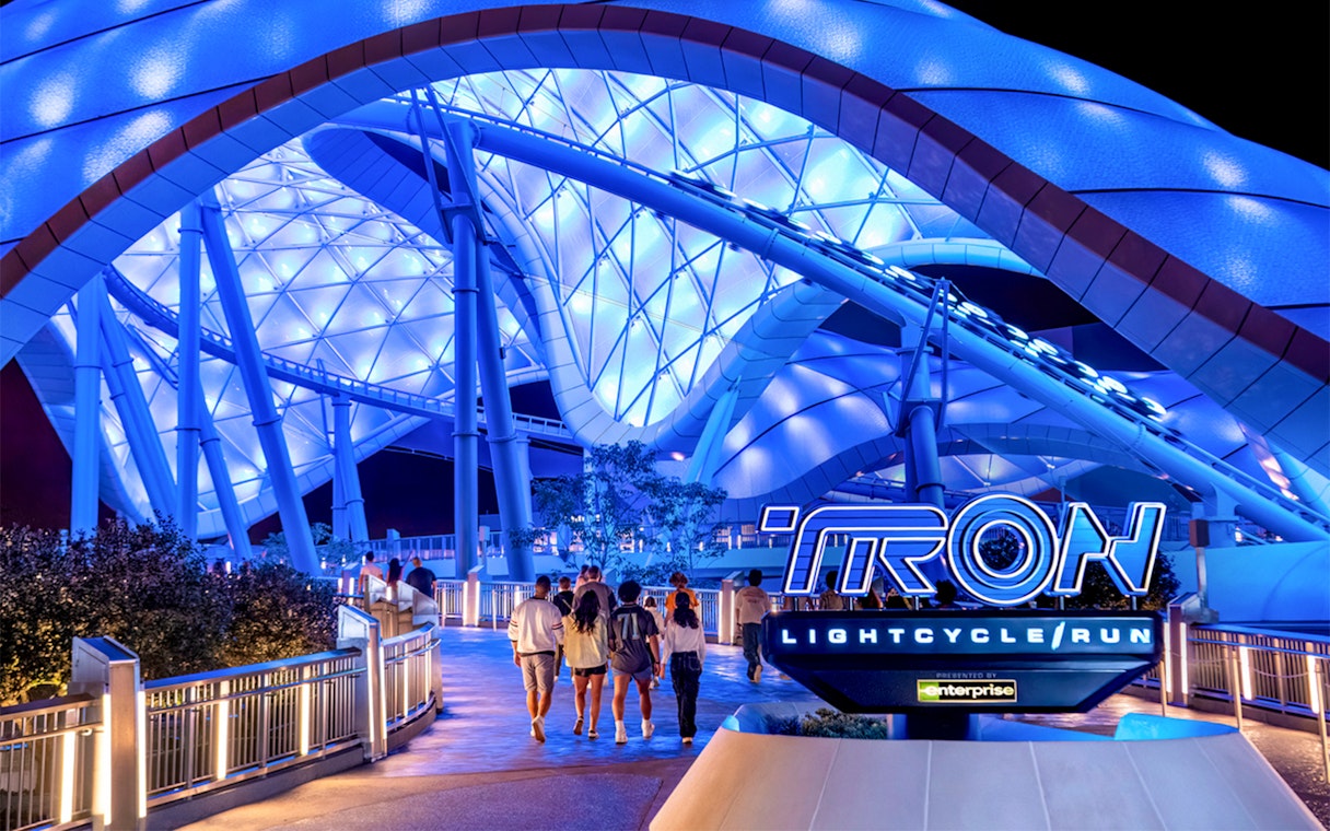 Visitors walking towards Tron Lightcycle ride at Magic Kingdom, Walt Disney Resort, Orlando.