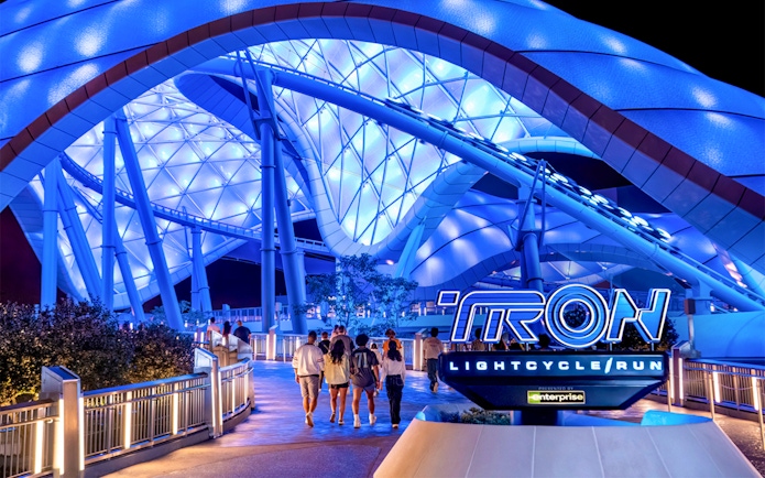 Visitors walking towards Tron Lightcycle ride at Magic Kingdom, Walt Disney Resort, Orlando.