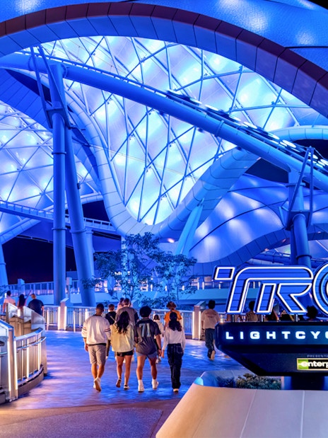 Visitors walking towards Tron Lightcycle ride at Magic Kingdom, Walt Disney Resort, Orlando.