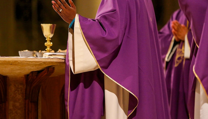 Notre Dame Cathedral interior during Mass, Paris, France.