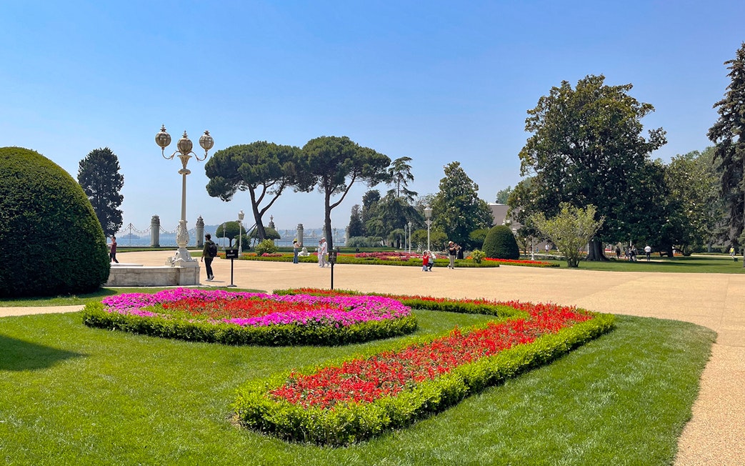 Palace gardens with colorful flower beds at Dolmabahçe Palace, Istanbul, Turkey.