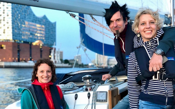 Sailing tour in the Port of Hamburg with Elbphilharmonie in the background.