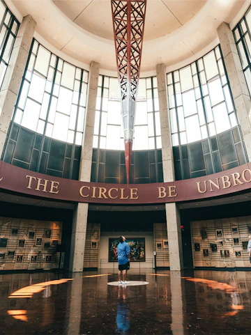 Visitor admiring the rotunda at the Country Music Hall of Fame and Museum in Nashville.