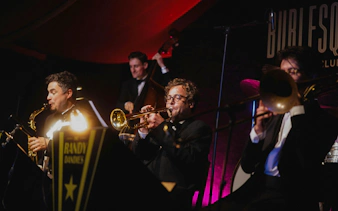 Musicians performing at Burlesque Dinner Club, Vienna.