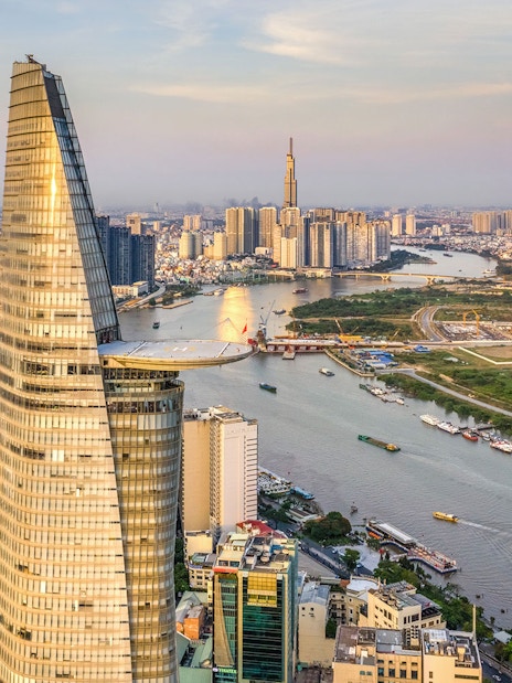 Panoramic view of Saigon cityscape with Landmark 81 and river.