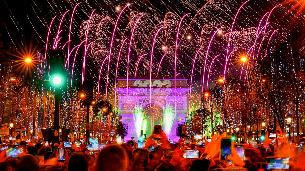 Fireworks over Arc de Triomphe during Champs-Élysées New Year Party in Paris.