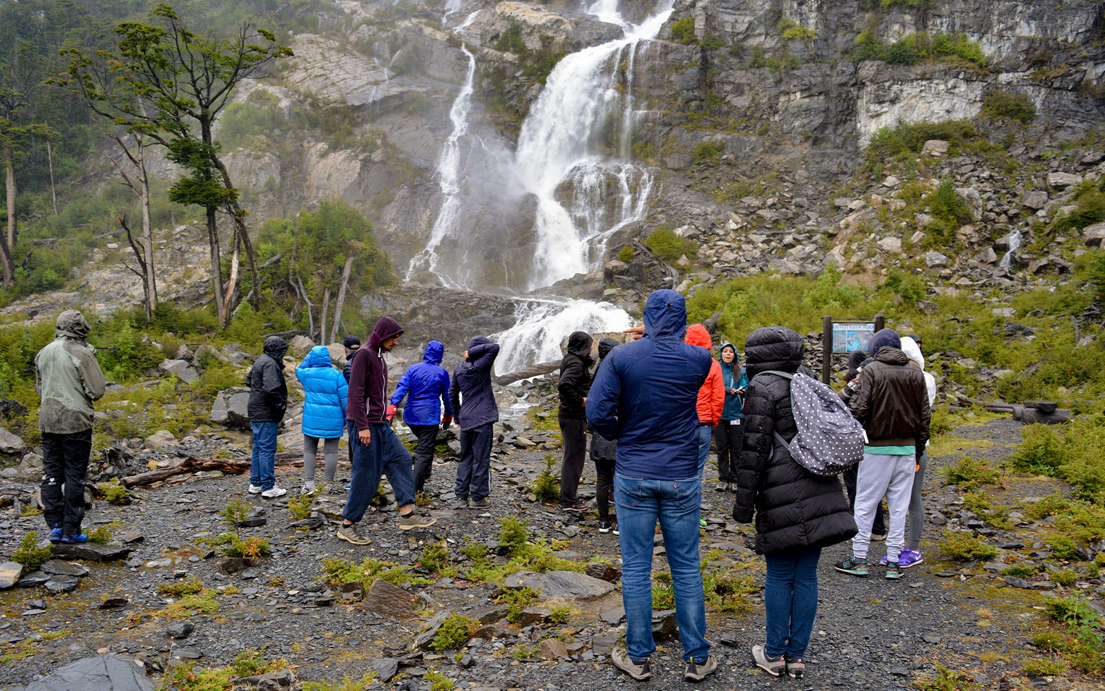Tourists with guide at Mayo Spirit Trek, Los Glaciares National Park, Patagonia, Argentina.