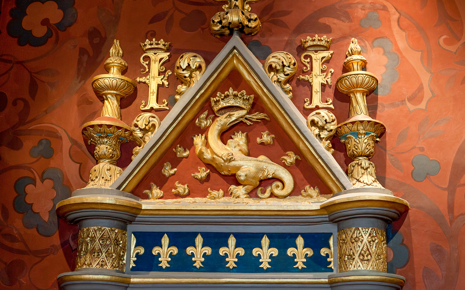 Royal Blois Castle ornate dragon and fleur-de-lis decoration.