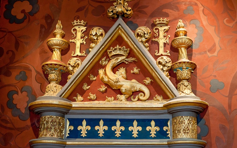 Royal Blois Castle ornate dragon and fleur-de-lis decoration.
