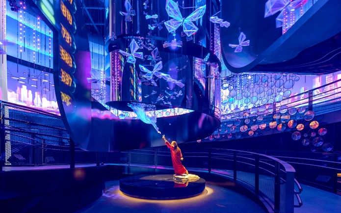 Interactive exhibit with digital butterflies at Expo City Dubai.