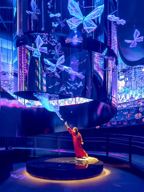 Interactive exhibit with digital butterflies at Expo City Dubai.