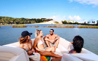 Pipa: Lagoa de Guaraíras Shared Speedboat Tour with Clay Bath and Sandbank Stops