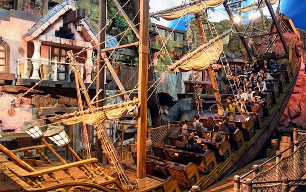 Visitors enjoying a pirate ship ride at Maxell Aqua Park Shinagawa.