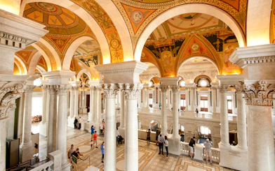 Library of Congress interior with ornate columns and arches, Washington D.C.