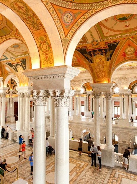 Library of Congress interior with ornate columns and arches, Washington D.C.