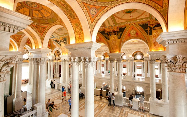 Library of Congress interior with ornate columns and arches, Washington D.C.