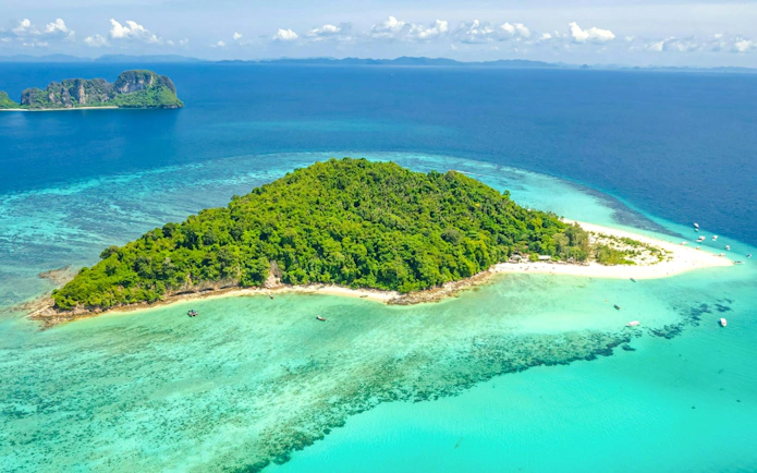 Aerial view of Bamboo Island with turquoise waters, part of the Phuket: Phi Phi & Bamboo Islands Catamaran Tour.
