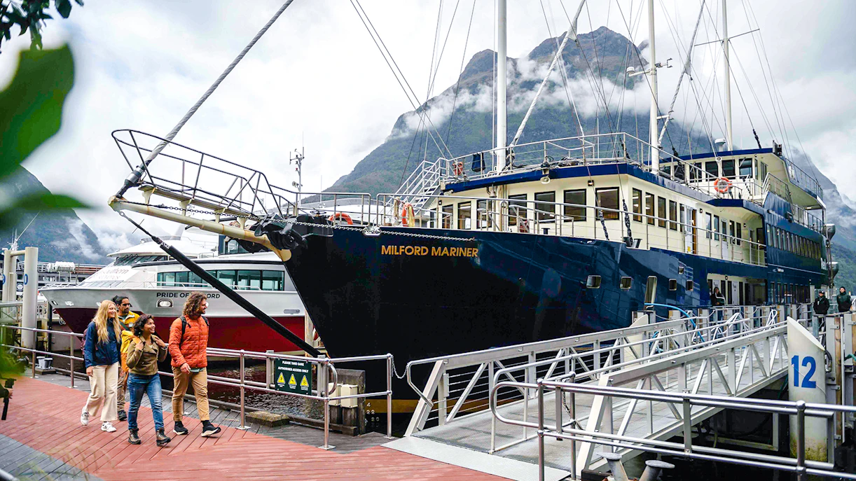 Tourists boarding the Milford Mariner vessel for an overnight Milford Cruise.