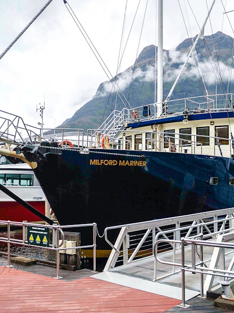 Tourists boarding the Milford Mariner vessel for an overnight Milford Cruise.