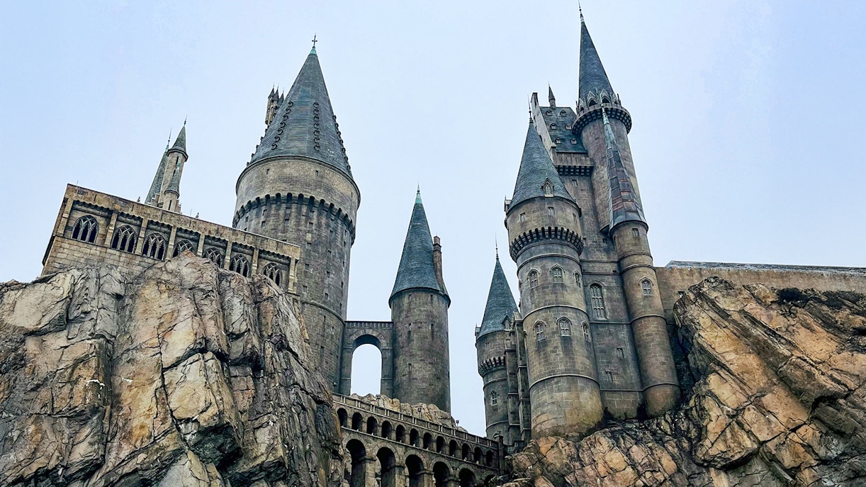 Hogwarts castle at Universal Studios Orlando, featuring stone towers and rocky landscape.