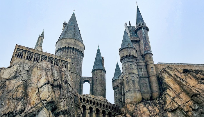 Hogwarts castle at Universal Studios Orlando, featuring stone towers and rocky landscape.