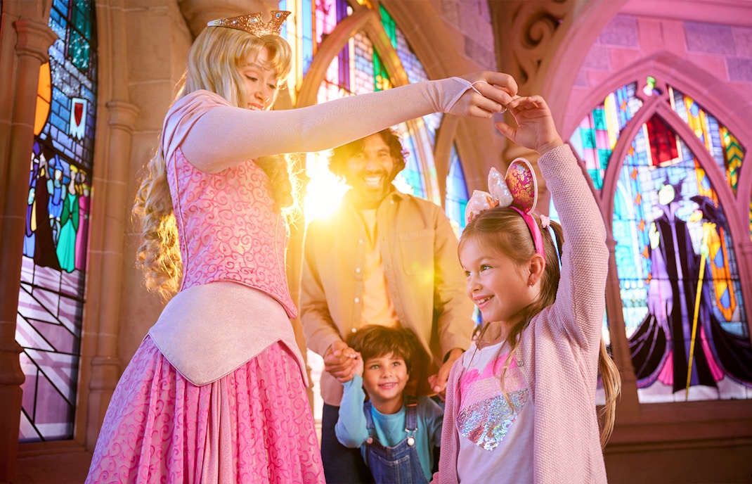 Family meeting Sleeping Beauty at Disneyland Paris.