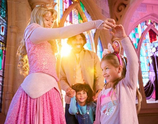 Family meeting Sleeping Beauty at Disneyland Paris.