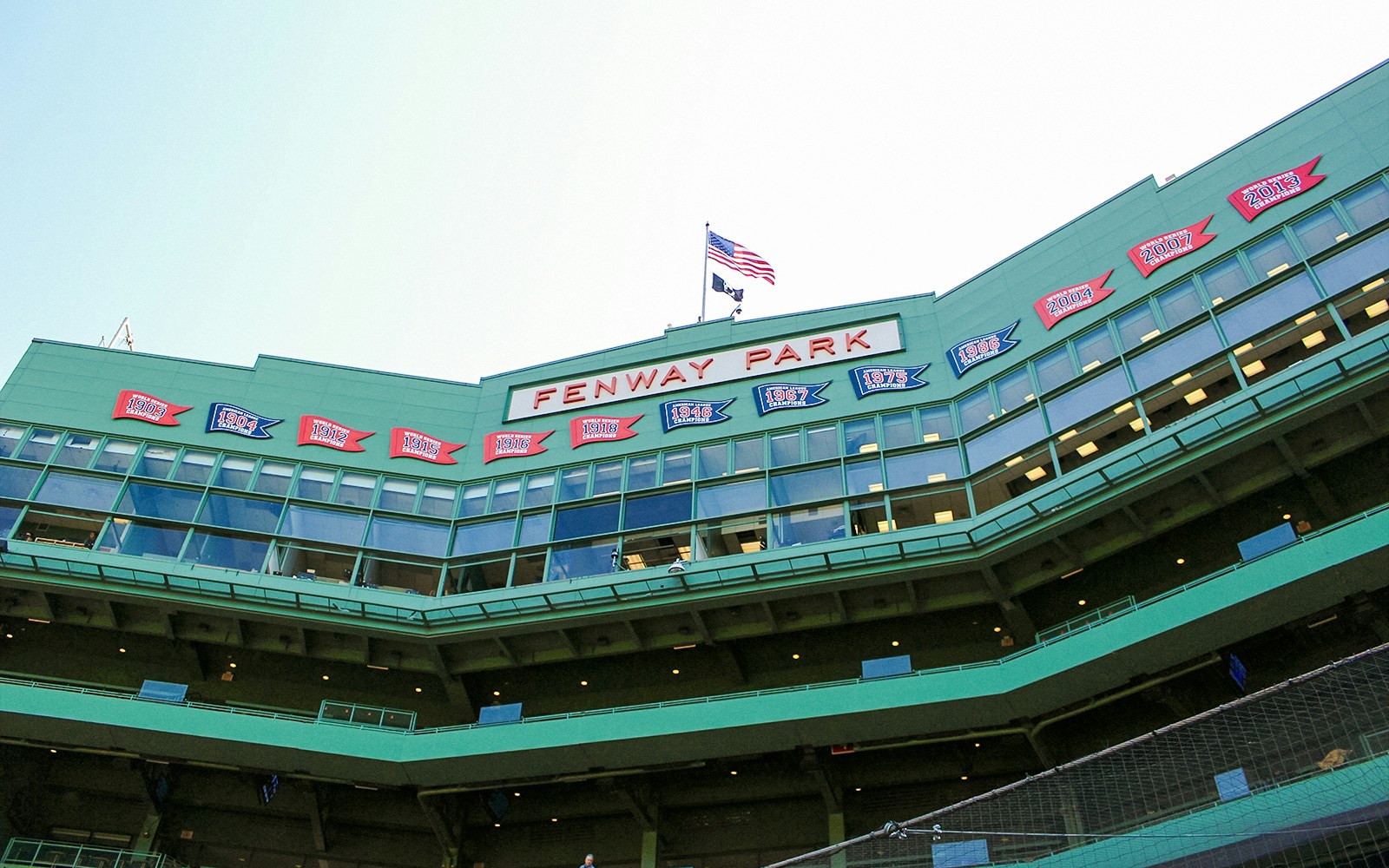 Fenway Park exterior with championship banners in Boston.