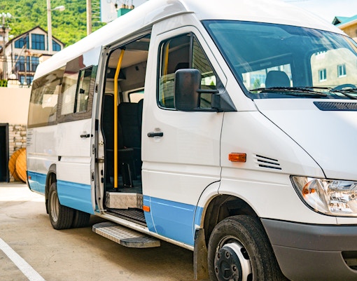 Tour shuttle bus for Pyramids of Giza excursion.