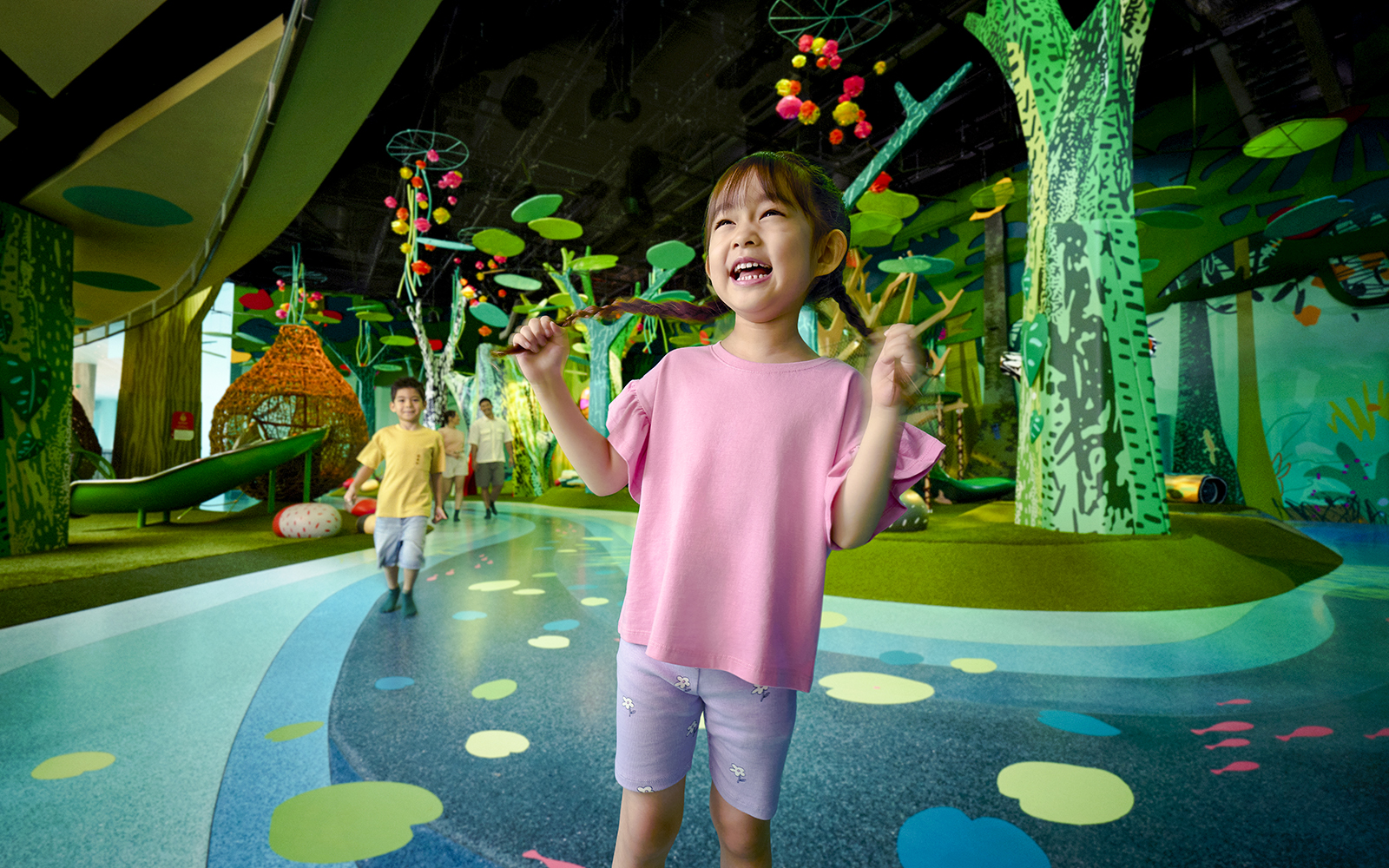Children playing at Curiosity Cove Main Entrance with colorful indoor playground.