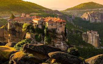 Monastery on rock formations in Meteora, Greece, during Delphi & Meteora Tour from Athens.