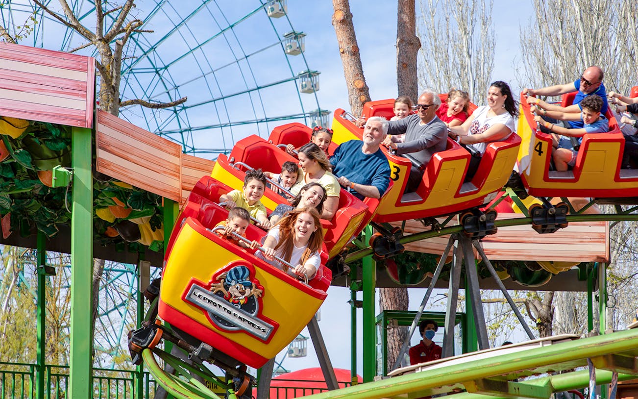Visitors enjoying a roller coaster ride at Mirabilandia Park.