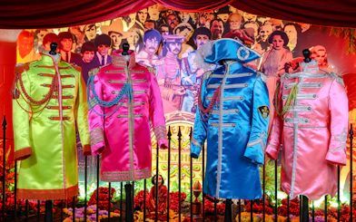 Sgt. Pepper's Lonely Hearts Club Band uniforms at The Beatles Story exhibit.